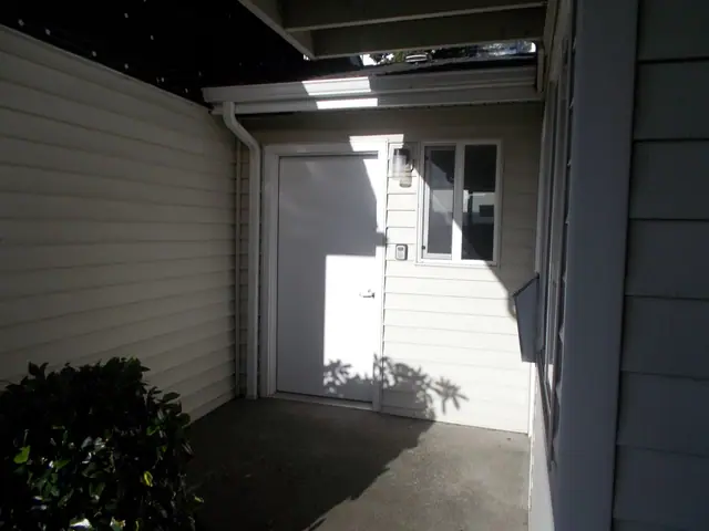Covered entry to an apartment door
