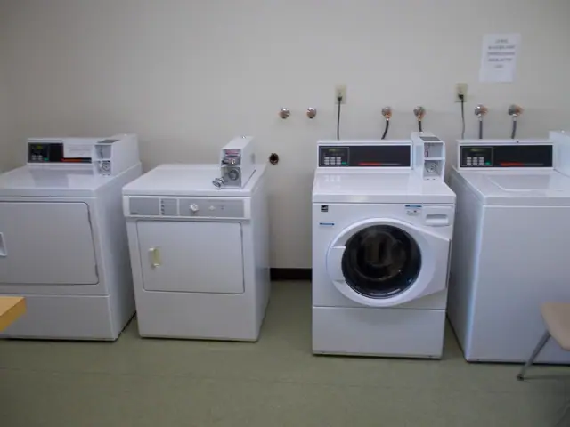 Laundry room with washers and dryers