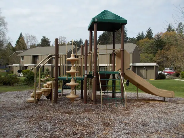 Playground with a slide and climbing tower