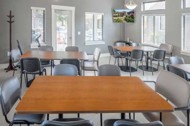 Community room with tables and chairs